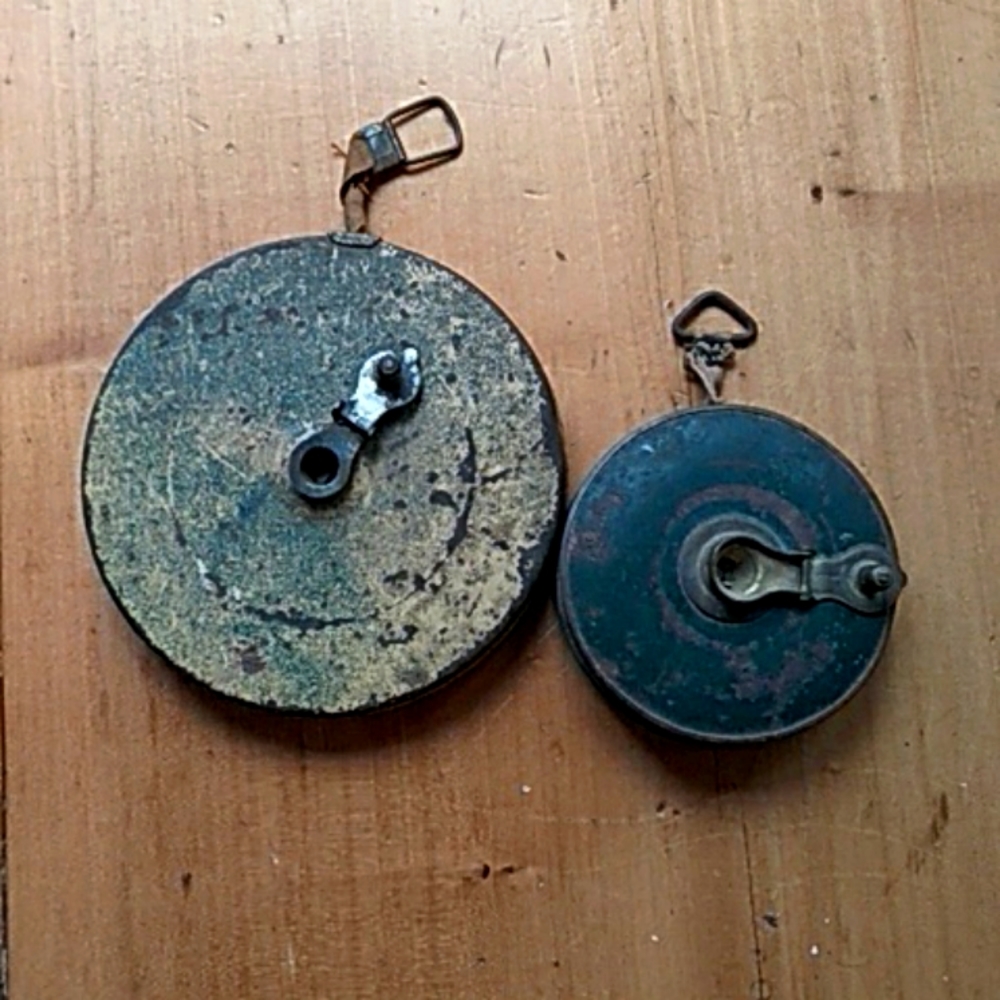 Set of Vintage metal tape measures.